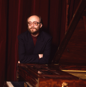 Alexis Lubimov. Portrait photograph taken of the musician at his fortepiano, Paris 1992. Russian pianist, born 1944.