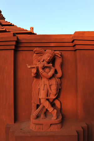 Terracotta image of a musician on the wall of The Konrak Natyashala (dance school) and Gurukul (home of the master) at Arka Vihara, in Puri district in Orissa, India. February 23, 2010.  (photo)