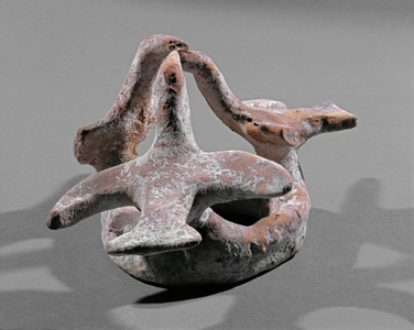 Three pigeons sitting on a ring …