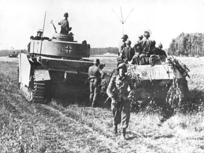 Radio car and Panzer IV during fighting in Russia, 1944 (b/w photo)