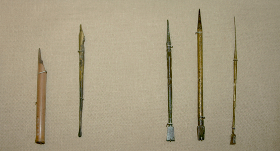 Left: Reed pen with a split nib from the Roman Era in Egypt circa 1st Century AD. On the right Styli (three stylus pens) used in the Roman Empire c2nd Century AD. (object)