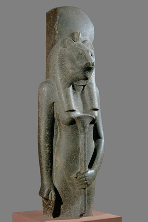The Goddess Sekhmet holding a sceptre in the form of a papyrus stalk …