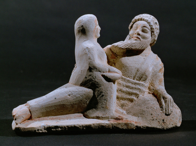 Couple at a banquet. Clay, red paint ...