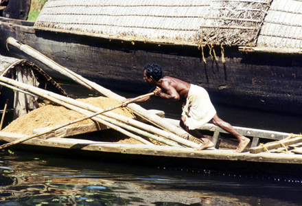 River navigation near Colombo - man on his boat, objects, people; ..., 1970 (photo)