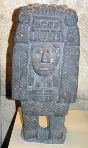 Standing figure of Chicomecoatl female deity associated with Maize and food. Aztec 1300-1521 AD. Pre-Columbian Mesoamerican Mythology. Sculpture