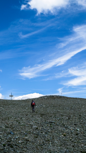 Hiker in the Matterhorn massif, Valais, Switzerland (photo)