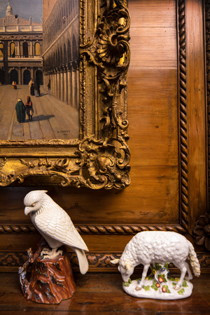 Porcelain figures of a bird and a sheep with corner of an old master painting by Coro…, 2017 (photo)