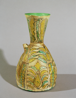Glazed ceramic pitcher with palm-leaf design …