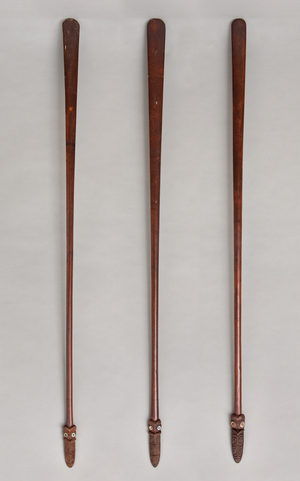Taiaha, long staffs,  l, c: 18th century, r: early 19th century (wood, paua shell)