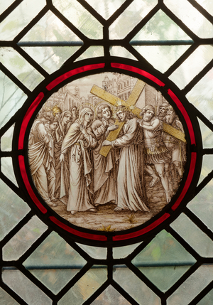 Former monastery (Zwartzusterklooster). The cloister. A stained glass window. Scene of Our Lady of Sorrows. The Meeting of Mary and Jesus on the Via Dolorosa.