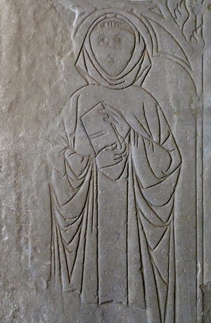 A monk holding a bible. 16th century (gres incise)