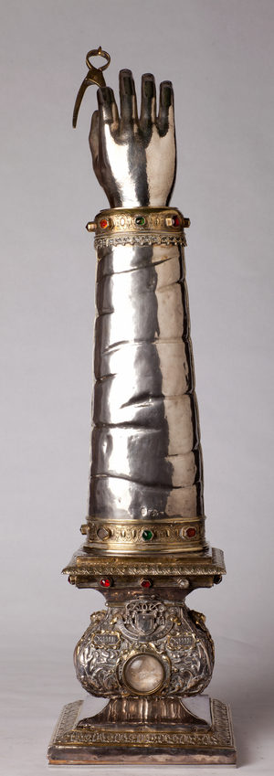 Reliquary arm of (Sainte Apolline). Silversmithing, copper, jewels. From the wardrobe of bischop Vilain de Gand.