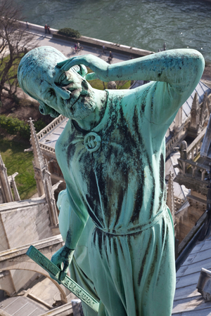 Saint Thomas, patron saint of architects, 18-19th century reconstruction by Viollet-le-Duc, Cathedrale Notre Dame de Paris (photo)