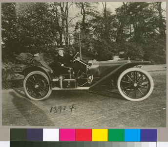 'Hang on your hat', Comedian W.C. Fields taking a ride in an American Underslung (b/w photo)
