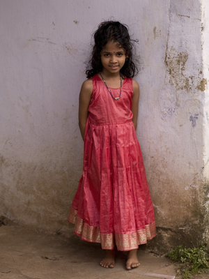 Portrait of Young Girl in Pink Dress in an Alley, Kochi, Kerala, India (photo)