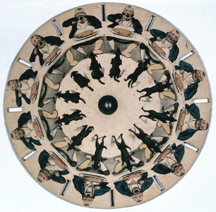 Fantascope: optical toy depending on persistence of vision for its effect. Picture spun on spindle and its reflection viewed in looking glass (mirror), giving impression of man eating and dog jumping up to steal food. From TM Baynes Fantascope, Ackermann, London, 1833. Aquatint .