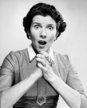 Portrait of a mid adult woman looking surprised