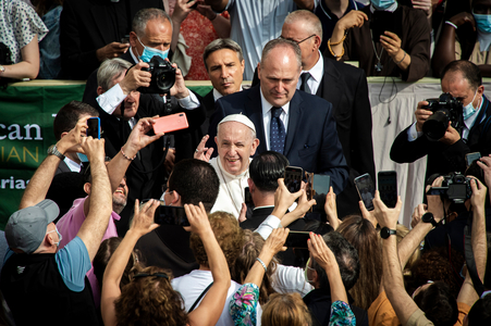 Pope Francis meets faithfuls at the end of a limited public audience at the San Damaso courtyard in The Vatican. (photography)