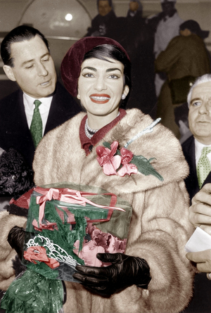 Maria Callas , Holding her Poodle Bellini in her Arms, Arriving at Paris Airport January 16, 1958, at her Right, Mr Lange, in Charge of Press Matters For Pathe Marconi (photo)