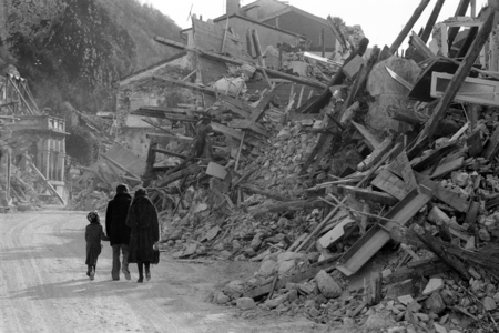 Residents in front of destroyed houses after the devastating earthquake in Friuli, Italy..., 1976 (photo)