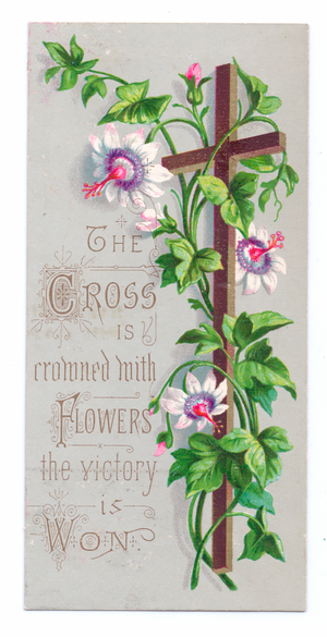 A Victorian religious card of a cross entwined with ivy and white hibiscus, c.1880 (colour litho)