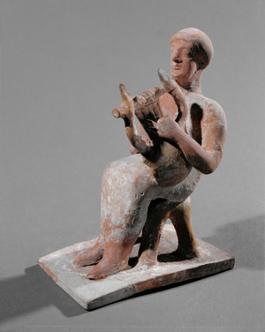 Musician on four-legged stool playing lyre, plectrum …