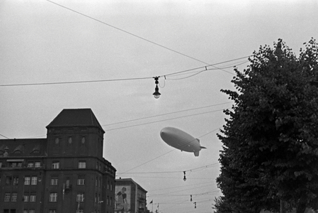 Zeppeilin Hindenburg LZ 129 at its olympic ride over Berlin, Germany 1930s (b/w photo)