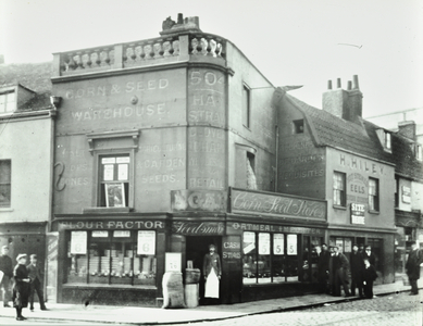 Deptford Broadway: street scene with shop fronts, London, 1897 (b/w photo)