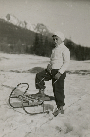 Child with a sledge, France, 1924 (b/w photo)