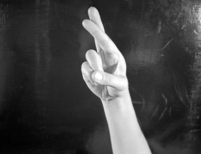 Letter R in finger alphabet (b/w photo)