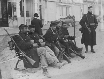 Belgian Soldiers Resting on Bench, 1916 (b/w photo)