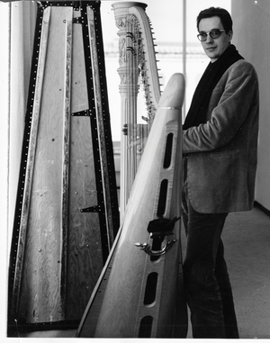 Klaus von Wrochem, composer standing with harp, 1966-7