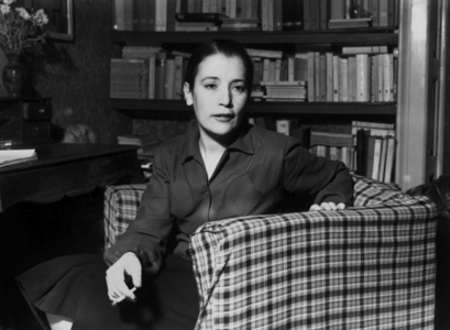 Anna Maria Ortese in her bedroom, Rome, 1953 (b/w photo)