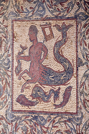 Europe, Portugal, Conimbriga, 1st Century AD Roman site, House of the Fountains, mosaic floor. Half man with animal legs and fish tail, holding fish.
