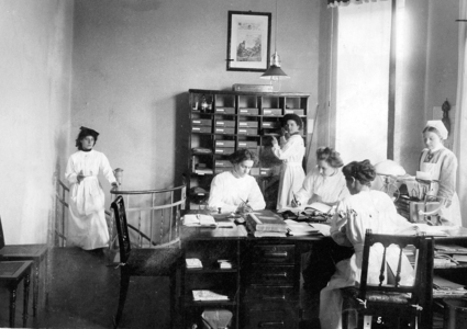 Nurses in an office, (1914) (b/w photo)