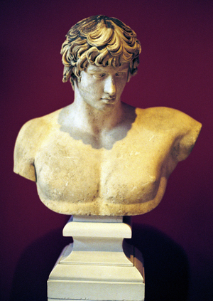 Bust of Antinous From Patras, (National Archaeological Museum of Athens) Antinous or Antinous (Greek: ????????) (111- 130) member of the entourage of the Roman Emperor Hadrian, to whom he was beloved. Antinous was deified after his death.