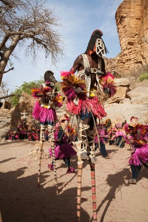 Dancers wearing Kananga masks perform at the Dama celebration in Tireli, Mali (photo)