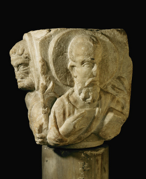 Capital of a column with heads of apostles