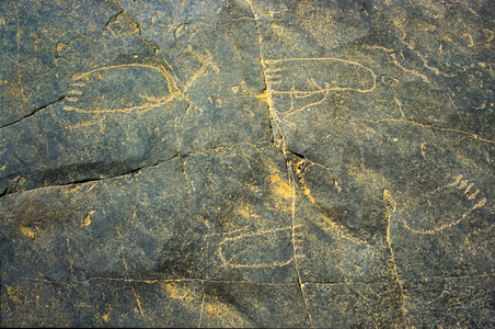 Graffiti, Dider, rock carvings with human footprints, Iherir oasis, Tassili n’Ajjer, Tadart Rouge, Tassili n'Ajjer, Algeria, 2000 (photo)