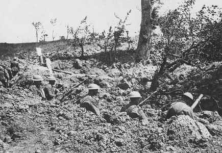 Soldiers Digging a Trench for an Artillery Piece, 1916 (b/w photo)