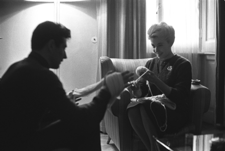 Milano, Italia, 1959, Eddy Campagnoli, famosa valletta di Mike Bongiorno, col marito, il portire Lorenzo Buffon nella loro casa (b/w photo)