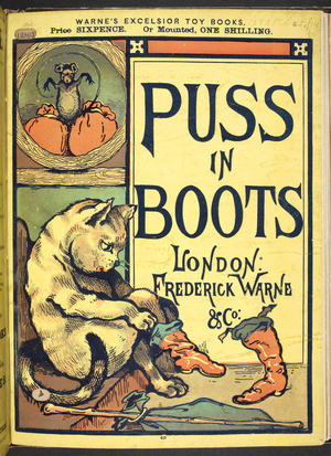 A cat trying on a pair of boots.