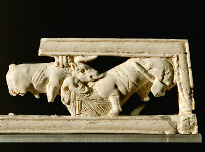 Lion attacking a bull (ivory)