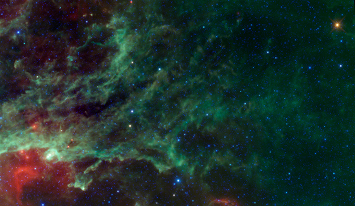 NASA's WISE captured this image of a huge complex of star-forming clouds and stellar clusters found in the constellation Cygnus.