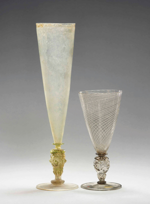 A Façon-de-Venise Latticinio wine glass and a flute, both late 16th century, probably Low Countries, Antwerp (glass)