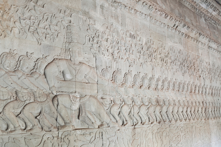 Bas relief depicting the churning of the ocean of milk, Angkor Wat, Cambodia (photo)