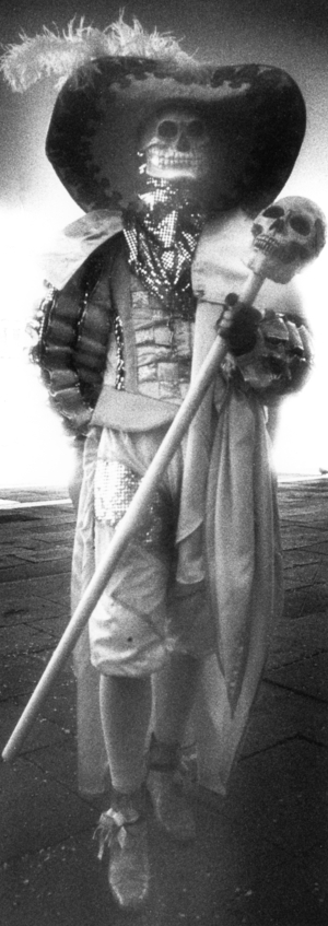 Carnival figure, Venice, Italy (b/w photo)