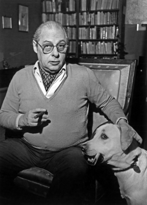 Roger Stephane (1919-1994) french writer and journalist, at home with his dog, 80's