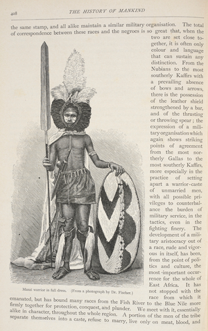 A Masai warrior in full dress, armed with a knife, spear and a shield