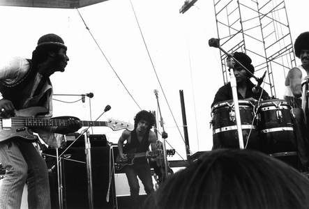 Guitarists David Brown and Carlos Santana during Music and Art Festival in Woodstock, August 1969 (b/w photo)
